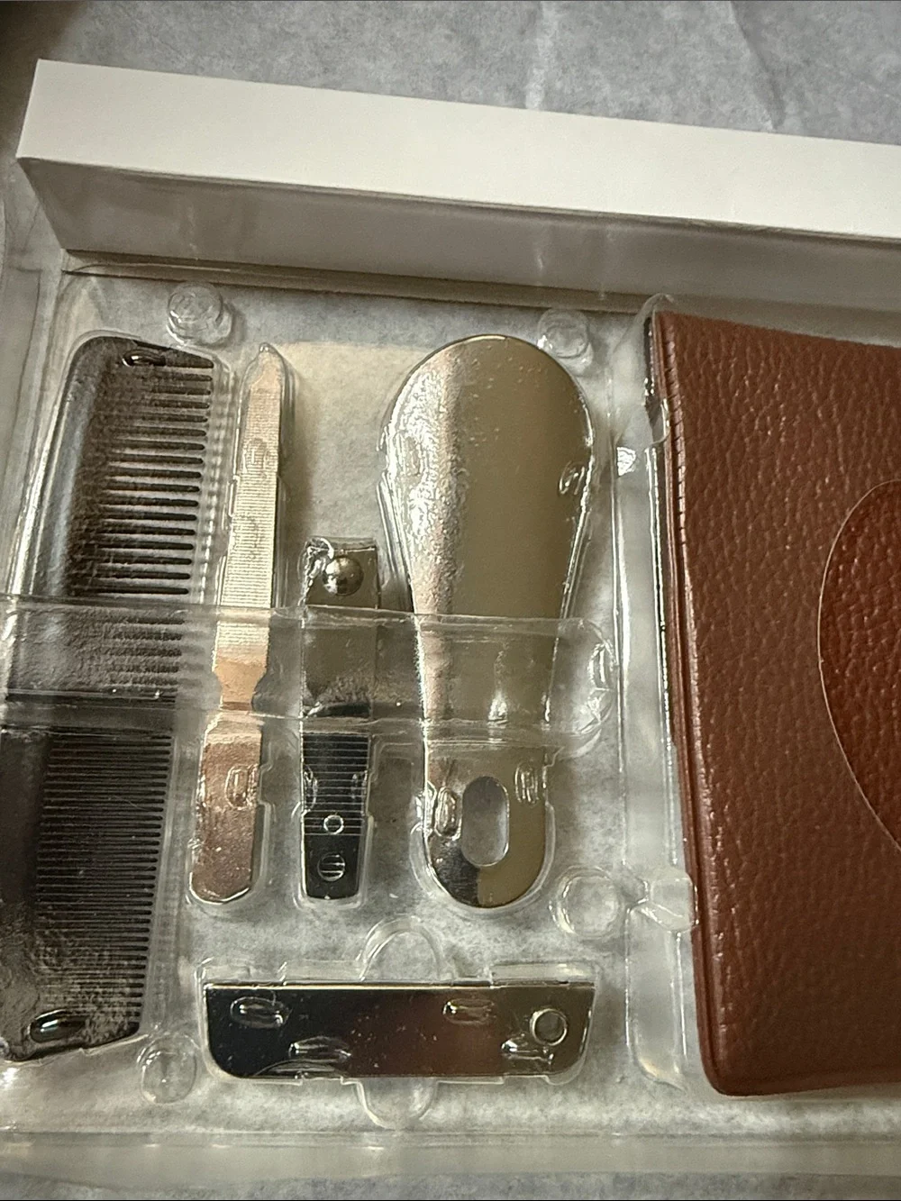 New in box Men's Travel Grooming Kit. Has never been removed.